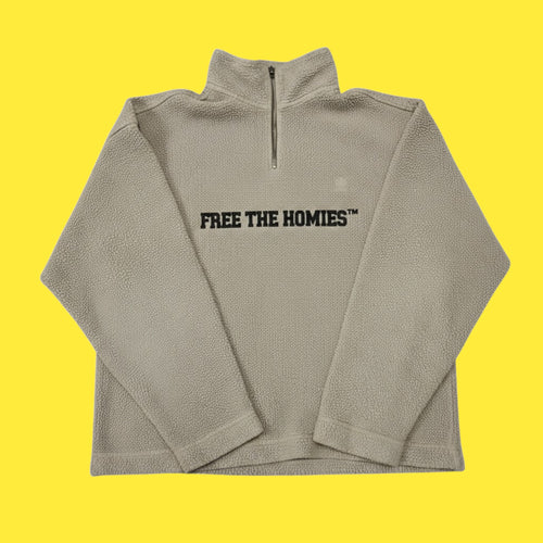 FTH x Tommy Hilfiger Rework Fleece 1/1 — beige sherpa half-zip with black FREE THE HOMIES™ embroidery, upcycled vintage streetwear piece.